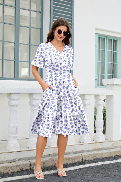 Vestido midi bohemio floral de corte A con bajo de volantes en capas