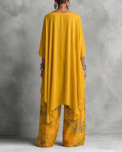 Conjunto de Top con Escote Barco y Bajo Asimétrico con Pantalón Floral de Pierna Ancha