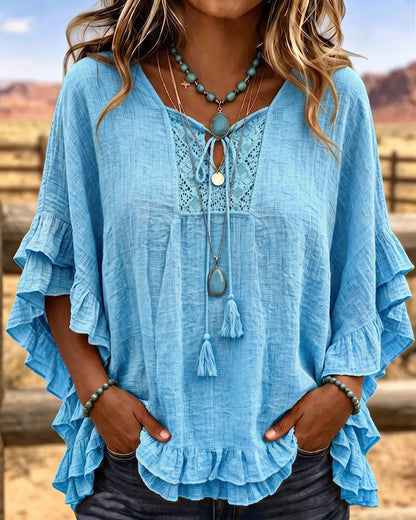 Top bohemio con mangas acampanadas y volantes.