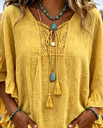 Top bohemio con mangas acampanadas y volantes.
