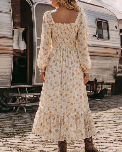 Vestido Maxi Bohemio Chic con Estampado Floral y Corte Imperio